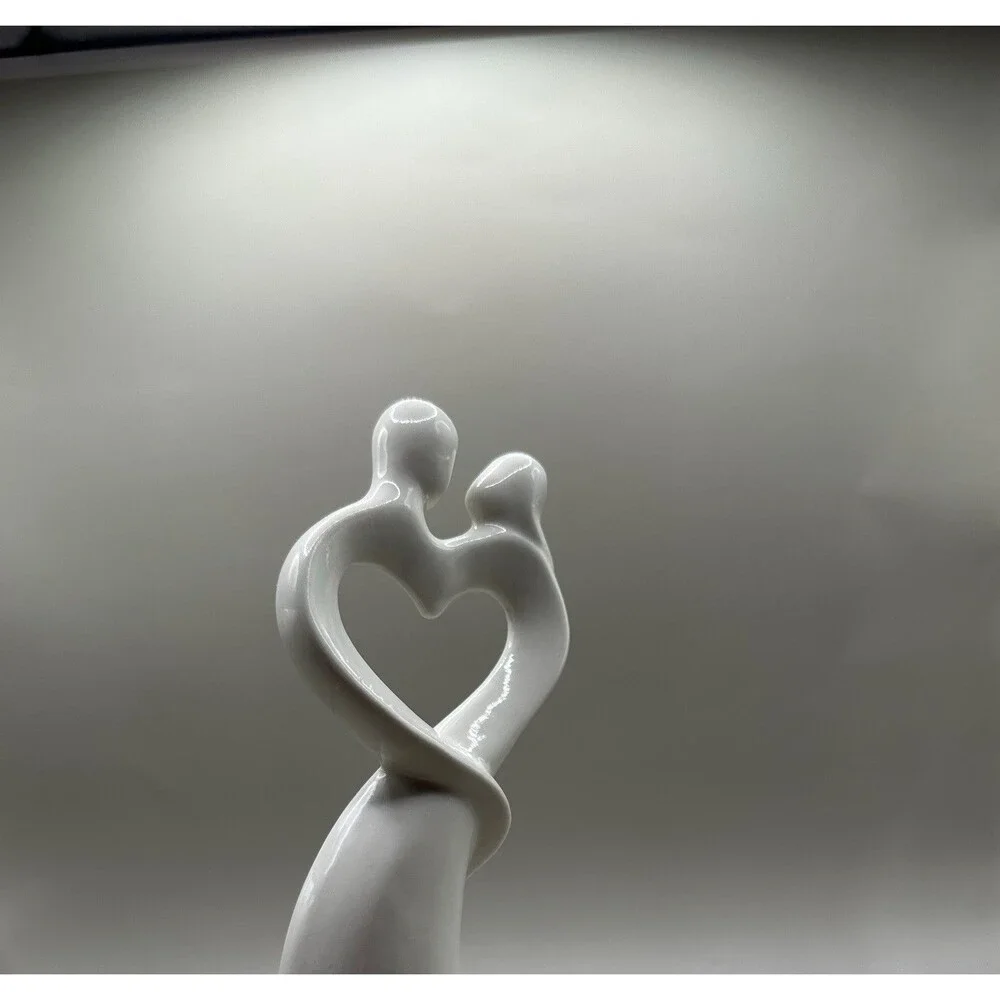 Elegant White Ceramic Couple Figurine Heart Embrace Minimalist Wedding Decor